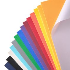 various colors of paper stacked on top of each other