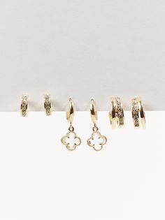 Indulge in a whimsical symphony of styles with this trio of enchanting earrings, where nature's charm intertwines with effortless elegance. Altar'd State Jewelry, Gold Mini Hoop Earrings, Elegant Small Hoop Jewelry With Charms, Elegant Small Hoop Earrings With Charms, Mini Gold Hoops, Earring Stacks, Teen Earrings, Earring Pack, Birkenstock Clogs