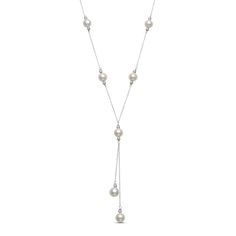 Shimmering freshwater cultured pearls are stationed along this elegant lariat necklace, with an additional pair dangling at staggered lengths from the center. Delicate textured beads bookend each pearl to complete the look. Crafted in sterling silver, the 18-inch cable chain secures with a spring ring clasp. Elegant Pearl Lariat Necklace With Dangle, Elegant Pearl Lariat Dangle Necklace, Elegant Pearl Dangle Lariat Necklace, Elegant Pearl Charm Lariat Necklace With Dangle, Elegant Lariat Necklace With Pearl Charm Dangle, Elegant Pearl Charm Dangle Lariat Necklace, Sterling Silver Lariat Pearl Necklace, Sterling Silver Lariat Pearl Necklace With Pendant, Elegant Dangle Lariat Necklace With Pearl Pendant