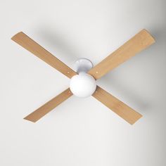 a white ceiling fan with wooden blades and a light bulb on the top of it