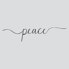 the word peace written in black ink on a gray background