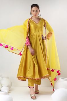 Yellow cotton silk anarkali with gota lace embroidery. Comes with pant and an organza dupatta. - Aza Fashions Yellow Suits Women Indian, Heavy Kurti Designs Latest, Silk Suit Designs Indian Latest, Silk Suits Designs Latest, Silk Kurti Designs Latest, Yellow Suit Design, Churidar Ideas, Anarkali Suits Designer Latest, Latest Indian Outfits