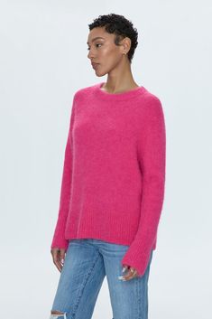 Classic scoop neck pullover sweater with long sleeves. Crafted from a medium weight wool blend with a fuzzy, cozy hand feel. Relaxed ribbing at collar, sleeves, and hem. Offered in a vibrant pink color pop hue. 55% Alpaca / 43% Nylon / 2% Spandex Hoc Summer, Hair Socks, Hot Sweater, Loungewear Shorts, Denim Jumpsuit, Scarf Hairstyles, Sweater Skirt, Knitted Pullover, Bottoms Pants