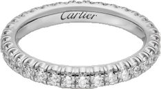 a white gold wedding band with round cut diamonds