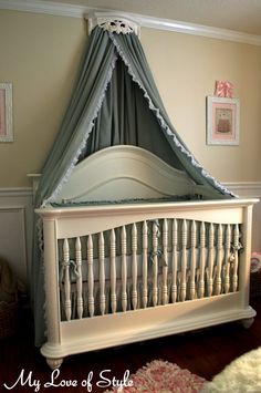 a baby crib in the corner of a room