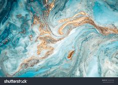 an abstract blue and gold marble background