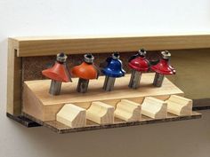 there are several different types of woodworking tools in the holder on the wall,