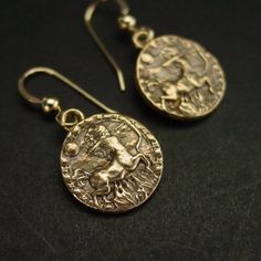 Handmade antiqued dainty and light birthday gift zodiac Centaur Sagittarius earrings.Sagittarius are: Generous, Idealistic, Great Sense of Humor.Handmade antiqued bronze coin charm with the zodiac sign of Sagittarius for people born between November 23 to December 21.The concept of the zodiac originated in Babylonian astrology, and was later influenced by Hellenistic culture. According to astrology, celestial phenomena relate to human activity on the principle of "as above, so below", so that th Zodiac Sign Brass Jewelry Gift, Brass Zodiac Sign Jewelry Gift, Silver Zodiac Sign Earrings As Gift, Silver Zodiac Sign Earrings For Gift, Silver Earrings With Zodiac Sign For Gift, Gold Zodiac Sign Earrings Gift, Centaur Sagittarius, Sagittarius Earrings, As Above So Below