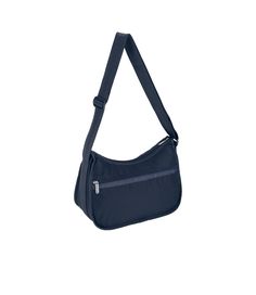 Zipped main closure, Exterior front pocket with zipped closure, Exterior back pocket with zipped closure, Interior back wall hanging zipper pocket, Adjustable shoulder strap (Max. 50in / 127cm), Includes matching pouch with zipped closureDimensions: 9H x 12W x 5.25D in, 22.86H x 30.48W x 13.34D cmMade with recycled content: The ripstop body fabric used for this product is made from recycled post-industrial fibers. Functional Navy Shoulder Bag With Pockets, Navy Shoulder Bag With Zipper Closure, Functional Navy Shoulder Bag With Zipper, Functional Navy Shoulder Bag With Zipper Closure, Blue Travel Shoulder Bag With Side Pockets, Blue Shoulder Bag With Side Pockets For Travel, Blue Solid, Sea Blue, Deep Sea