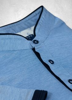 Runs small. Considered a Slim fit; fitted through the chest, armholes and sides Inspired by the effortless style worn in Como, our Ultra-Luxurious Perfect Polo Shirt with Band Collar, in Azure Blue is meticulously crafted from the finest mercerized cotton and breathable technical fibers in the world. The mercerization process adds ultra-smoothness and softness, and the result is the most luxurious polo shirt, engineered to keep you cool all day long. We have added bespoke design elements such as Trim Board, Azure Blue, Collar Designs, Band Collar, Bespoke Design, Warm Weather, Effortless Style, Design Elements, Bespoke