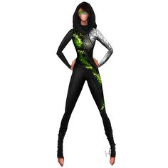 a woman in a black and green body suit