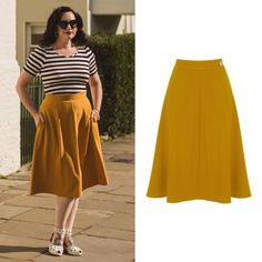 Have you ever struggled to find a classic and elegant skirt you can style for work and evening glam? Our flattering A-line skirt is the perfect addition to your wardrobe. It's made in a beautiful heavyweight crepe fabric and features a side pocket, side zipper and a contrasting natural Corozo button. This design drapes perfectly at or just below the knee and has an authentic vintage feel to complete your look. Why not pair it with a t-shirt or cropped sweater to complement your style. This versa Classic Fitted A-line Skirt, Fitted Full Pleated Skirt For Workwear, Fitted Box Pleat Midi Skirt, Classic Full Skirt For Workwear, Fitted Box Pleat Skirt For Work, Fitted Workwear Skirt With Box Pleat, Fitted Box Pleat Skirt For Office, Fitted Office Skirt With Box Pleat, Classic Flared Skirt For Workwear