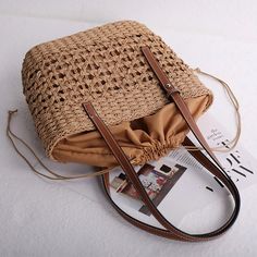 SPECIFICATIONSBrand Name: BOBAGOrigin: Mainland ChinaCN: GuangdongLining Material: POLYESTERPlace Of Origin: GUANG DONG ProvincePlace Of Origin: GUANG DONG ProvinceShape: Casual ToteMain Material: LinenStyle: fashionClosure Type: OPENOccasion: VersatileModel Number: Woven BagPattern Type: hollow outInterior: Interior Slot PocketInterior: Interior CompartmentGender: WOMENDecoration: NONEExterior: NONEHardness: HARDMaterial: paper ropelarge beach bag: bolsas praia femininasbeach wicker bag: beach Large Beach Bags, Retro Purse, Handmade Purse, Small Shoulder Bags, Wicker Bags, Tote Bags Handmade, Handmade Purses, Straw Bags, Woven Rattan