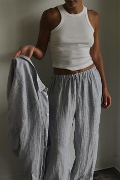 Experience effortless style with our new Patricia Linen Pant. Our premium linen fabric offers a lightweight and soft texture, perfect for every season. The simple elastic waistline and functional side pockets make this pant a versatile choice - wear it high on your waist for a tailored look or lower on your hips for a relaxed vibe. Coordinate with our Arlo Top for a timeless outfit.Made in USA Spring Casual Bottoms With Straight Hem, Casual Linen Bottoms For Daywear, Casual Spring Bottoms With Straight Hem, Casual Bottoms For Spring With Straight Hem, Relaxed Linen Wide Leg Pants For Daywear, Relaxed Fit Wide Leg Linen Pants For Daywear, Linen Summer Pants For Daywear, Summer Linen Pants For Daywear, Versatile Summer Wide Leg Pants