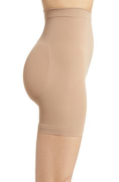 Sculpt your body's natural shape with shaping shorts that hit just above the knee with a whisper-soft and seamless design from Kim Kardashian's SKIMS. Reflecting the brand's passion for highly technical shapewear solutions for every body, this staple piece smoothes your upper legs while lifting your butt and comes in different shades to complement your skin tone. 5" regular inseam Cotton-lined gusset 82% nylon, 18% elastane Machine wash, tumble dry Made in Turkey Beige Smoothing Shapewear Mid-thigh Length, Shapewear With Soft Touch And Mid-thigh Length, Mid-thigh Length Shapewear With Soft Touch, Soft Touch Mid-thigh Length Shapewear, Compressive Mid-thigh Length Shapewear With Soft Touch, Beige Seamless Mid-thigh Shapewear, Short Shaping Shapewear With Soft Touch, Beige Shapewear Smoothing Shorts, Beige Smoothing Shapewear Shorts