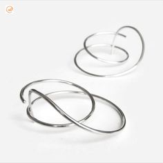 Edith Toledano | Sterling Silver Large Thick Hoop Studs, Gauged Hoops for 18g Piercings, Spiral Wire Earrings, Sculptural Statement Hoop Earrings, Ear Jackets | #SterlingSilverHoops #SterlingSilverHoopStuds #SterlingSilverHoopEarrings #HoopEarrings #HoopStuds #LargeHoops #ThickHoops #GaugedHoops #18GaugePiercings #SpiralEarrings #WireEarrings #SculpturalEarrings  #StatementEarrings #EarJackets #EdithToledano #Etsy Stud Jewelry