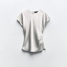 Round Neck Top With Short Sleeves. Tapered Waist. Back Opening With Hidden Button Closure. Silver Silver Formal Tops For Spring, Formal Silver Spring Tops, Chic Silver Blouse For Spring, Chic Silver Blouse For Summer, Chic Silver Summer Blouse, Fitted Silver Top By Zara, Fitted Silver Zara Top, Chic Silver Tops For Workwear, Elegant Silver Tops For Summer