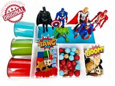 an assortment of action figures and candy in containers