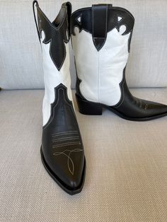 "Premium White & Black western leather with white stitching. Leather upper and lining.  Casual handmade leather boots. Super soft leather lining. Size 36: 2\" Wood Heel 9\" Shaft  13.75\" opening If you don't see your size available, please reach out. EU 36 : US 6 EU37: US 7 EU38: US 8 EU39: US 9 EU40: US 10 If you wear half sizes, please size up." White Country Style Boots For Ranch, White Snip Toe Boots For Ranch, White Country Boots For Ranch, White Snip Toe Country Boots, White Country Boots With Snip Toe, White Snip Toe Heeled Boots For Ranch, White Snip Toe Heeled Boots For Rodeo, White Western Snip Toe Boots, White Western Boots With Snip Toe