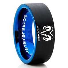 a black and blue ring with white lettering on the inside, in front of a white background