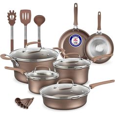 an assortment of pots and pans with utensils