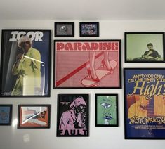 there are many posters on the wall