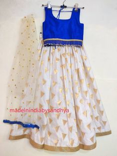 Product: Custom made girl kids dress. Size : All sizes possible. Price listed for dress for kids up to age 1-4 years. Additional $10 for age 4-8 years. Additional $20 for age 8-12 years. Fabric: Lehenga- silk with gota work border Top -raw silk Dupatta - net embroidered Delivery Time : Please keep me informed for any dates or times frame you keeping in mind. White Dresses With Dori Work For Festivals, Fitted White Lehenga For Celebration, Festive White Party Skirt, White Anarkali Choli For Celebration, White Choli With Dori Work For Celebrations, Festive Fitted White Skirt, White Fitted Skirt For Festive Occasions, Traditional White Festive Skirt, Festive White Skirt For Festivals