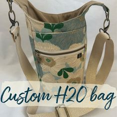 a purse with the words custom h2o bag on it and an image of flowers