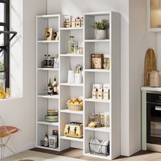 a white bookcase filled with lots of different types of food and drinks on top of it