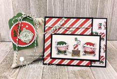 a christmas card with santa's sleigh and two little pigs on it