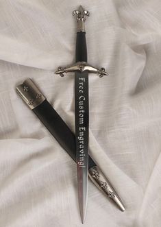 two knifes laying on top of each other on a white sheet with the words fear, comfort and truth