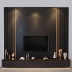 an entertainment center with a flat screen tv mounted on the wall and decorative vases