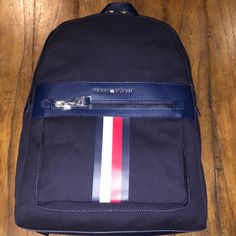 Blue Tommy Hilfiger Backpack Modern Blue Backpack Bag, Navy Backpack With Zipper Closure, Modern Blue Backpack, Tommy Hilfiger Blue Travel Bag, Tommy Hilfiger Blue Bags For Daily Use, Blue Satchel Backpack With Zipper Closure, Blue Satchel Backpack With Zipper, Tommy Hilfiger Travel Backpack, Blue Leather Casual Backpack