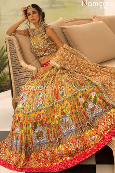 Pakistani Traditional Lehenga Choli for Mehndi is a classic masterpiece in Yellow color embellished with resham, booties, stones, pearls, crystals, royal motifs, tilla, sequins and gorgeous dabka work making it a perfect Lehenga Choli for Mehndi. Choli: Classy Bridal Choli in yellow color is an epitome of beauty having gorgeous embellishments of sequins, mirror work, pearls, crystals, stones and gleaming gold work. Little touch of multi-colors enhances the overall glamour and traditional look. L Indian Outfits Modern, Traditional Lehenga, Dabka Work, Pakistani Traditional, Ethereal Elegance, Latest Bridal Lehenga, Mehendi Outfits, Floral Frocks, Indian Outfits Lehenga