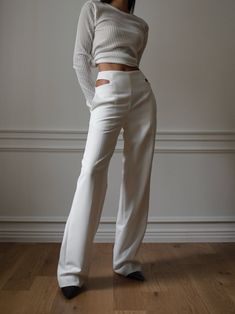 Tailored trousers with straight cut and slight flare leg. Cut out waist detail. Model is in MINUSEY S. ✔️ Free worldwide express shipping over $100✔️ Loved by 6,500+ customers✔️ Limited edition collections, maximum style⠀⠀⠀⠀⠀⠀⠀⠀⠀Stay ahead of the trend with can’t-find-anywhere-else staples. Your closet will thank you 💕 * MINUSEY S = EU 34, US 2* MINUSEY M = EU 36, US 4* 77% Polyester / 18% Rayon / 5% Spandex* Dry clean* Made in Korea - Model Height: 172cm/5'7" (US2, EU34) Modern White Formal Pants, Modern White Wide Leg Pants For Formal Wear, Modern White Wide Leg Pants For Formal Occasions, Modern White Formal Wide Leg Pants, Classic White High-waisted Wide Leg Pants, Tailored White Wide Leg Pants, White Tailored Wide-leg Dress Pants, Tailored White Wide-leg Dress Pants, White High-waisted Wide Leg Pants