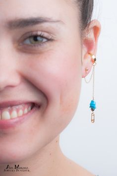 "Wear your unique attitude with our one of a kind no-pierce ear cuffs. Made with a 14k gold filled safety pin pendant combined with Hematite and Turquoise gemstones, this gold filled dangling ear cuff makes a bold yet delicate statement. For this unique EAR CUFF earring, you need only ONE piercing! The cuff is placed on the middle ear cartilage so it will look like you have a piercing there as well! In a hurry to get your package? Add this listing to your cart before checkout to upgrade from reg Unique Ear Cuffs, Ear Cuff Chain, Earrings Punk, Punk Rocks, Cuff Earring, Graduation Jewelry, Boho Chic Earrings, Pin Earrings, Safety Pin Earrings