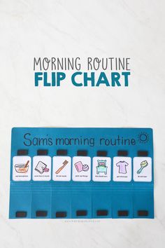 a blue flip chart sitting on top of a white counter next to a sign that says morning routine flip chart