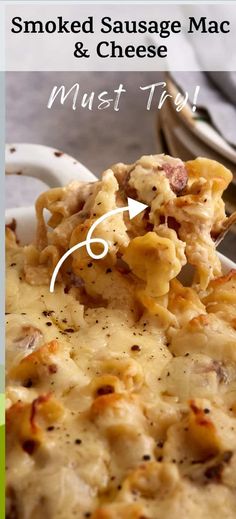 a close up of a spoon with food on it and the words smoked sausage macaroni and cheese must try