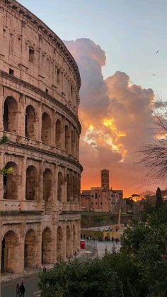 the roman colossion at sunset in rome, italy