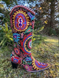 "Tall Embroidered Cowgirl Boots Silk Petit Point with leather interior. These one of a kind hand made boots are created from hand drawn designs on cotton canvas, inspired by original designs from ancient Uzbekistan textile history.  Height measures 15.5\" on the side with a 2 1/2\" heel and calf measures 15\". Size 39 (US9) available. 100% silk petit point with leather interior. Black colored leather stacked heel with leather sole.  Handmade in Uzbekistan. Your purchase preserves and encourages Multicolor Western Festival Boots, Multicolor Western Boots For Festivals, Traditional Fitted Boots For Fall, Bohemian Multicolor Boots For Festivals, Multicolor Bohemian Boots For Festivals, Multicolor Embroidered Boots, Traditional Embroidered Boots For Fall, Traditional Embroidered Fall Boots, Traditional Fitted Boots With Round Toe