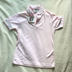 Here I Have The Eagles Eye Light Pink Vintage Polo “Gilford” Shirt With Embroidered Collar. This Shirt Is Brand New Never Worn Still With Tags And Comes In A Size Small.This Shirt Is Vintage And Has No Rips, Tears Or Stains And Comes From A Smoke And Pet Free Home.It Also Has Working Buttons And An Embroidered Flower On The Collar With Blue Edging Around The Collar And Sleeves.More Details Are In Pictures. Please Feel Free To Ask Me Any Questions. I Am Negotiable On Price So Please Feel Free To Preppy Fitted Top With Polo Collar, Preppy Collared Cotton Tops, Preppy Cotton Collared Tops, Preppy Collared Summer Tops, Fitted Preppy Polo Shirt For Spring, Spring Fitted Preppy Polo Shirt, Spring Preppy Fitted Polo Shirt, Preppy Short Sleeve Tops For Spring, Spring Preppy Short Sleeve Tops