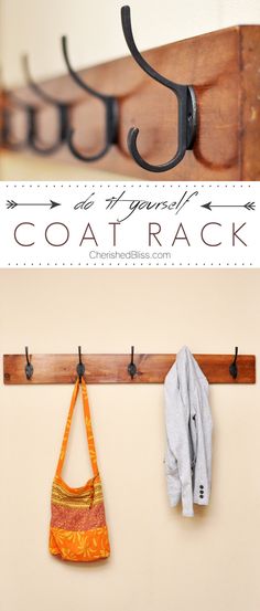 a coat rack with two coats hanging on it