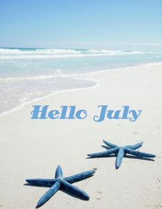 two blue starfishs on the beach with words hello august in front of them