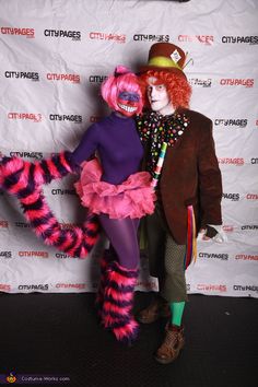 two people in costumes standing next to each other