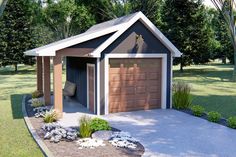 a small house with a garage in the middle of some grass and trees behind it