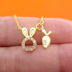 Bunny Rabbit and Carrot Charm Necklace in Gold or Silver | DOTOLY Easter Bunny Design Jewelry Gift, Carrot Jewelry, Rabbit And Carrot, Baby Jewelry, Small Charms, A Bunny, Brass Charms, The Bunny, Kids Jewelry