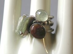 Spring Green Stacking Rings Set by dolldisasterdesign on Etsy Unique Green Stackable Rings, Green Oval Prehnite Rings, Prehnite Gemstone Ring Jewelry, Unique Rectangular Natural Stone Rings, Unique Green Rectangular Rings, Earthy Gemstone Rings As Gifts, Earthy Gemstone Rings For Gift, Earthy Gemstone Rings For Gifts, Unique Green Rings With Natural Stones