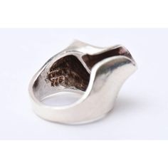 This is part of Chairish’s Costume Jewelry assortment.  This wonderful hallmarked sterling silver ring is both sculptural and modernist. It is marked 925 sterling and TH-47. It has a great design to it and has dimension. The ring size is 5.25. It has height of 1.5" H. The width is 1". The open horseshoe shape on top looks best when facing to the right. It has a wide band in the back. Well made.  Sorry the photos do not do justice to the beauty of this unusual ring. It is from the 60's. It is ver Modernist Open Signet Ring For Formal Occasions, Modernist Open Dome Ring As Gift, Modernist Signet Ring With Polished Finish, Modernist Sterling Silver Open Ring, Modernist Sterling Silver Rings, Contemporary Silver Ring With Unique Design, Modernist Open Ring With Polished Finish, Formal Sculptural Silver Jewelry, Unique Open Signet Ring For Collectors