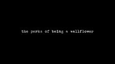 the perks of being wallflower text on a black background with white writing underneath it