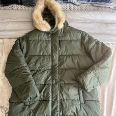 Beautiful Green Parka For Women Nwt Never Worn Size 2x Great For These Really Cold Days If You Have Any Questions Please Feel Free To Ask I Don’t Have Measurements As This Is No Longer Available On The Gap Website Military Green Parka With Adjustable Hood, Military Green Parka With Pockets, Green Parka, Khaki Long-sleeved Parka With Multiple Pockets, Casual Nylon Parka With Double-lined Hood, Nylon Parka With Double-lined Hood For Cold Weather, Long Parka, Gap Jacket, Cold Day